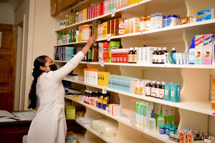 Pharmacy, Medication and Pharmacist Explaining a Prescription To a Female Patient in a Chemist ... Pharmacy, Medication and Pharmacist Explaining a Prescription To a Female Patient in a Chemist ...